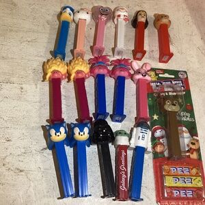 17 Boxed and Loose Pez Dispensers with Wonder Woman disney star wars and more.